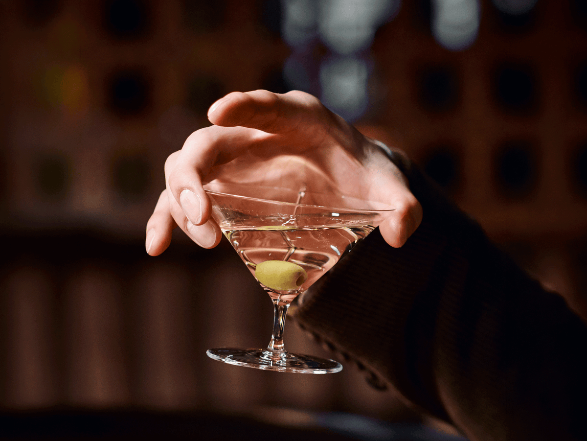 A martini served in a SIP AND GUZZLE KASA glass